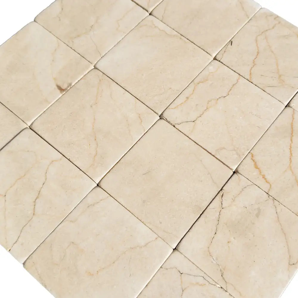 Square Crema Marfil Select marble tiles with a tumbled finish for elegant flooring