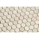 Beige hexagonal tile pattern from Crema Marfil Select Marble 1 inch Mosaic Tile