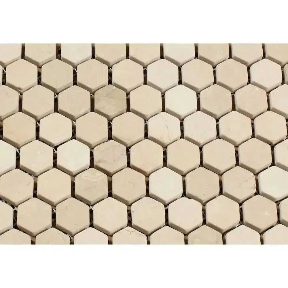 Beige hexagonal tile mosaic from Crema Marfil Select Marble 1 Inch Tumbled Hexagon Mosaic