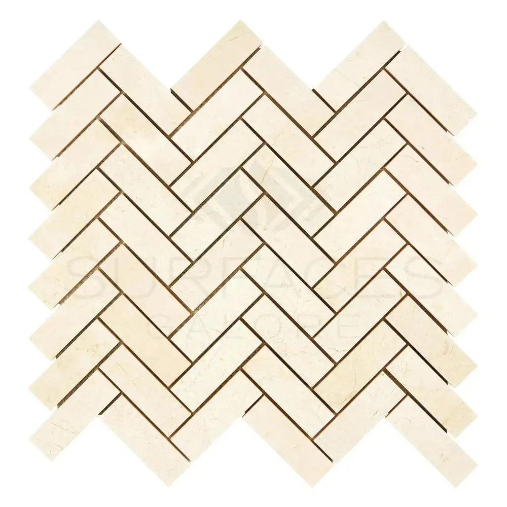 Herringbone pattern of light-colored Crema Marfil Select Marble 1X3 mosaic tiles