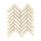 Light-colored Crema Marfil Select Marble herringbone mosaic tiles with polished or honed finish
