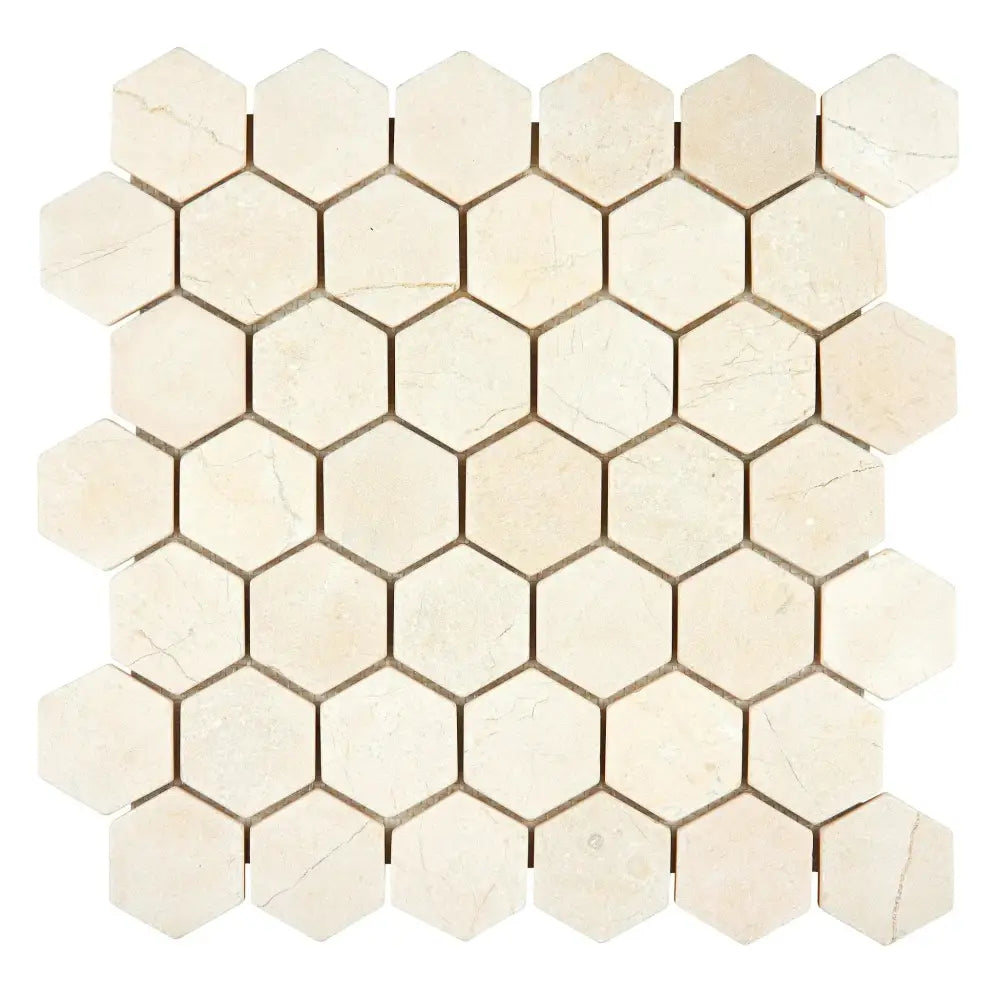 Beige hexagon tile mosaic from Crema Marfil Select Marble 2 Inch Hexagon Tumbled