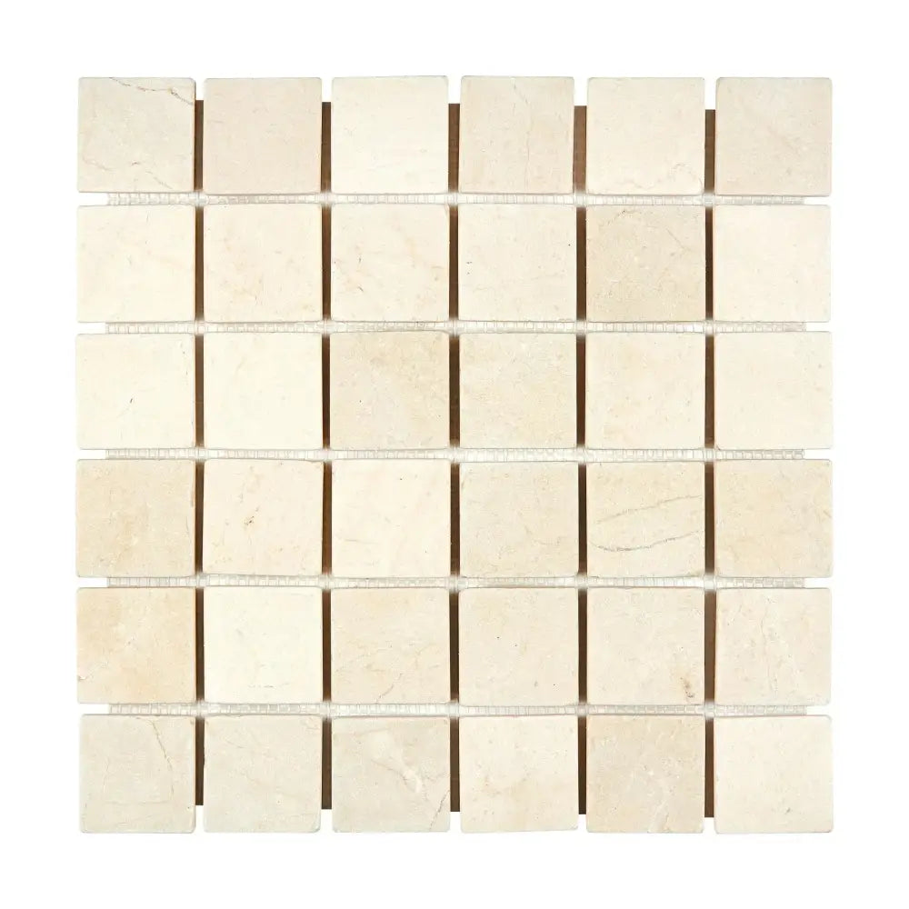 Square mosaic tile sheet of Crema Marfil Select Marble 2X2 Tumbled for elegant flooring