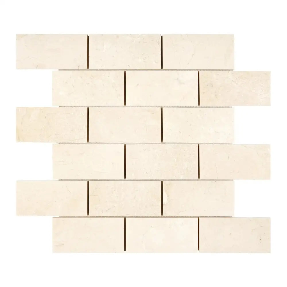 Off-white brick mosaic tile from Crema Marfil Select Marble for elegant flooring or walls