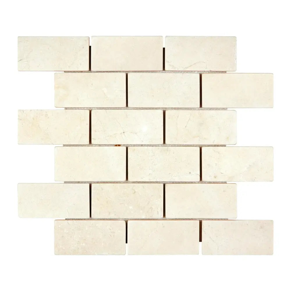 Beige brick mosaic tile from Crema Marfil Select Marble 2X4 Brick Mosaic Tumbled