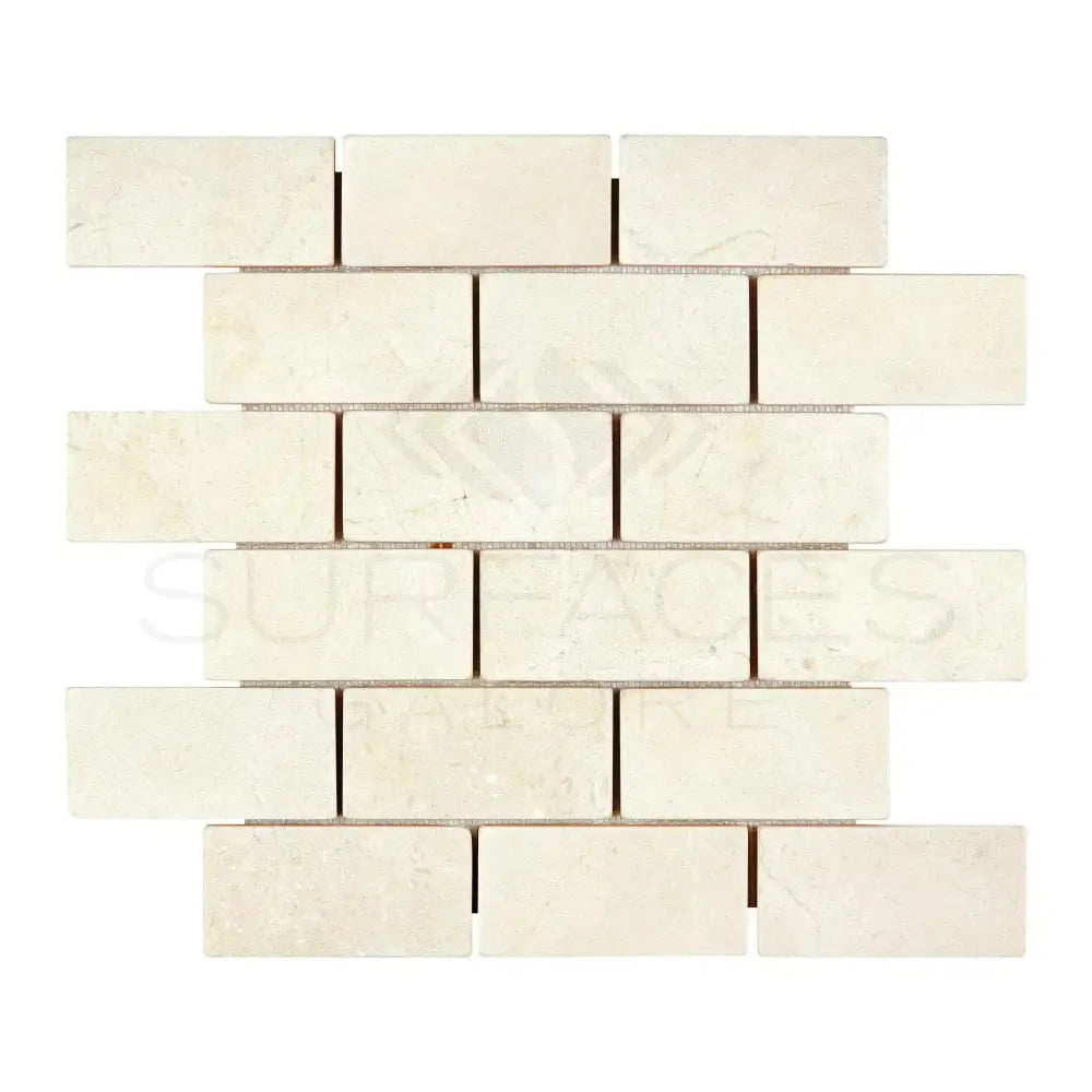 Rectangular off-white brick mosaic tile from Crema Marfil Select Marble 2X4 Tumbled