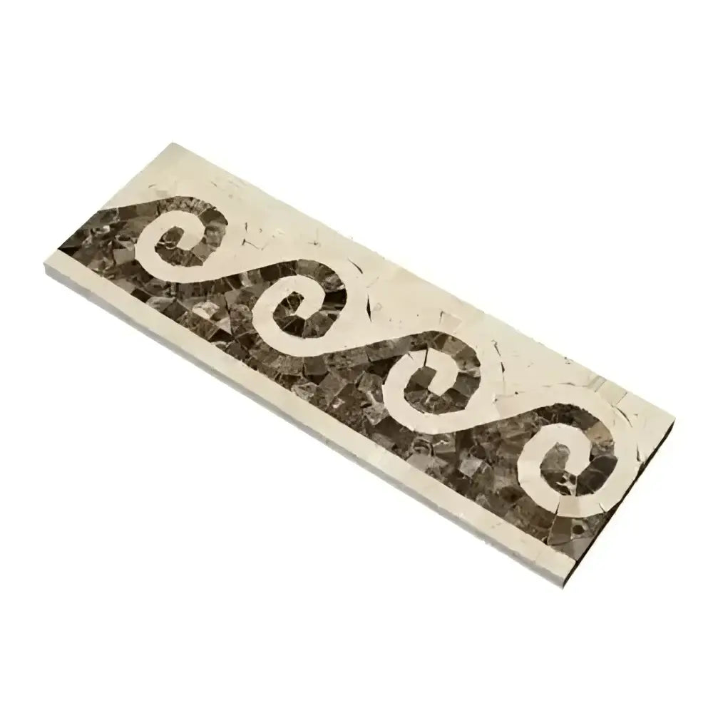 Mosaic tile border with wave pattern in Crema Marfil Select Marble polished finish