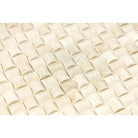 Neatly arranged baklava pieces on Crema Marfil Select Marble mosaic surface