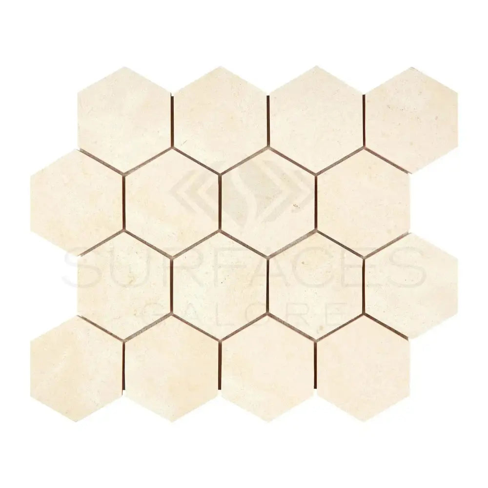 Beige hexagon tile mosaic from Crema Marfil Select Marble 3-inch Tumbled collection