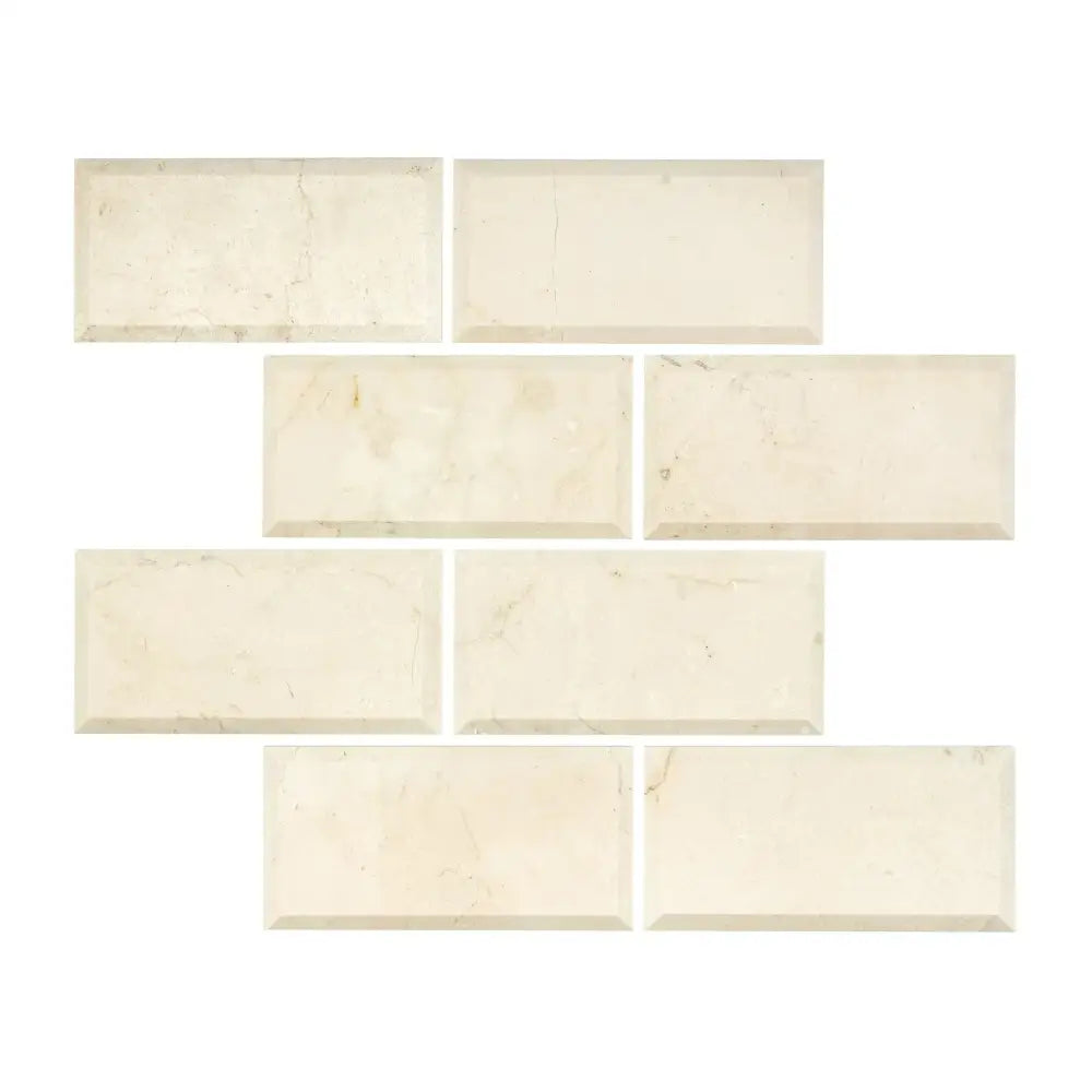 Rectangular off-white Crema Marfil Select Marble 3x6 tiles with deep beveled edges