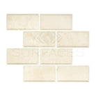 Beveled cream-colored Crema Marfil Select Marble 3x6 tiles polished or honed