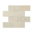 Off-white brick wall pattern on Crema Marfil Select Marble 3x6 Tumbled product