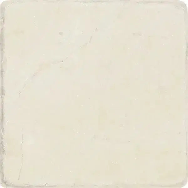 Off-white square tile from Crema Marfil Select Marble 4X4 Tumbled collection