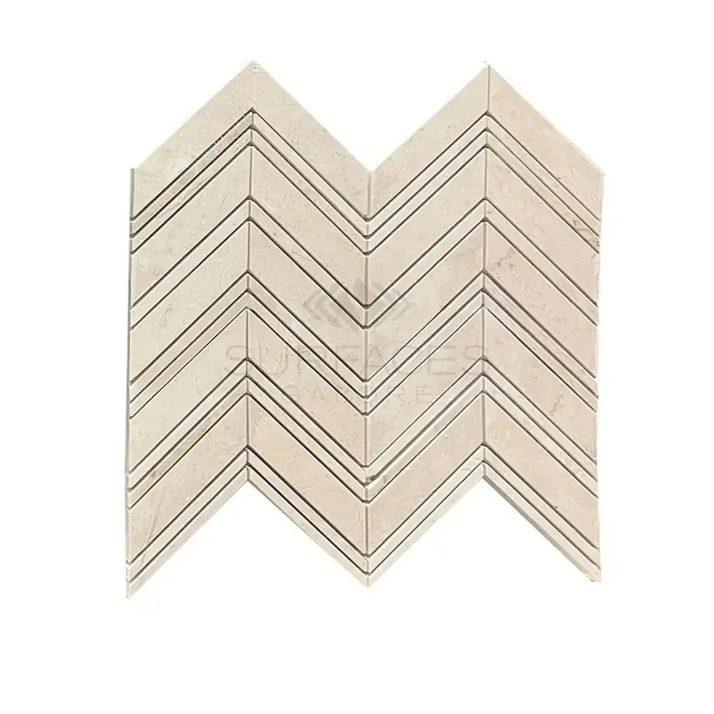 Crema Marfil Select Marble Chevron patterned tile for sophisticated flooring design