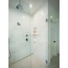 Modern glass shower with White Dolomite Prestige 10 Inch Hexagon Mosaic Marble