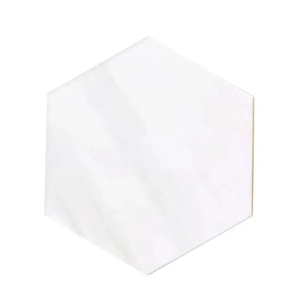 White hexagonal marble tile from Dolomite Prestige 10-inch hexagon mosaic collection