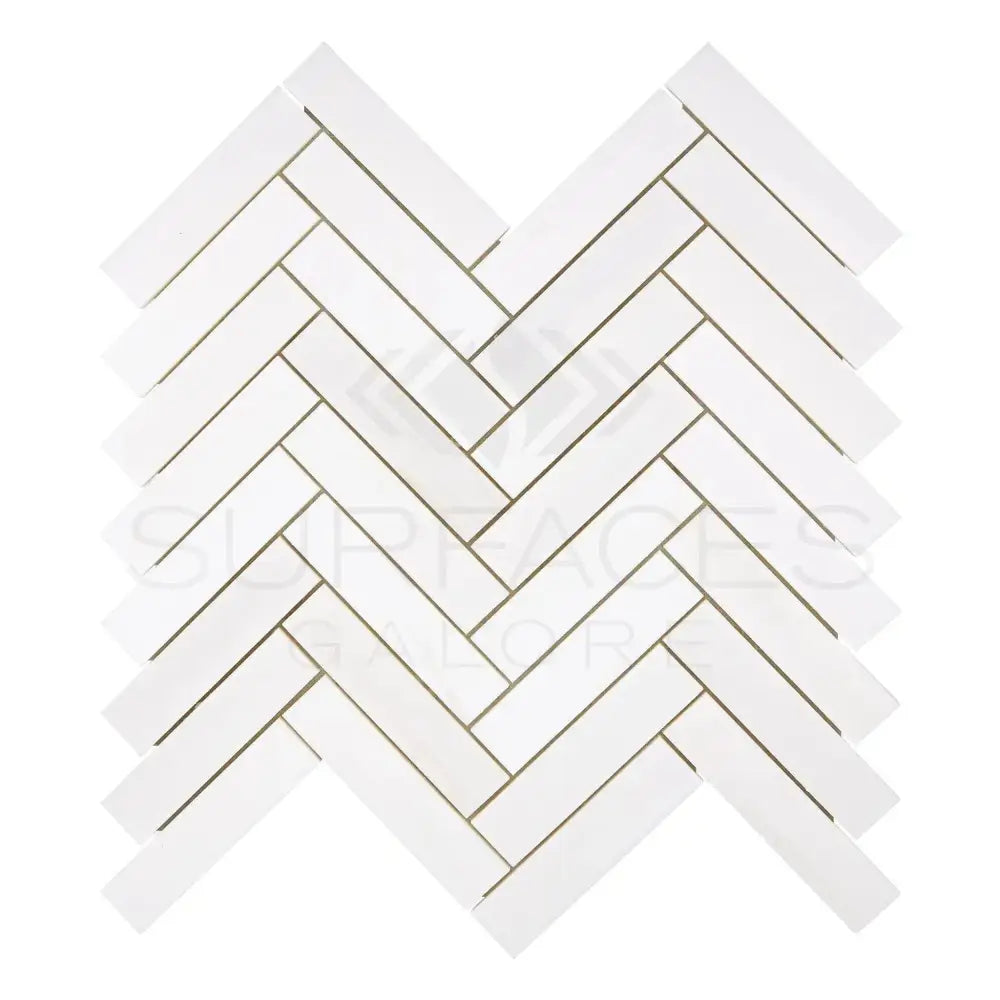 White herringbone tile pattern in Dolomite Prestige 1x4 Herringbone Marble Mosaic