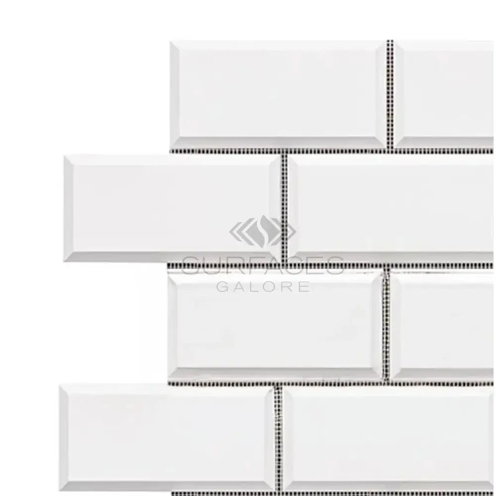 White beveled subway tile from Dolomite Prestige 2x4 mosaic marble collection