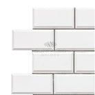White beveled subway tile from Dolomite Prestige 2x4 mosaic marble collection