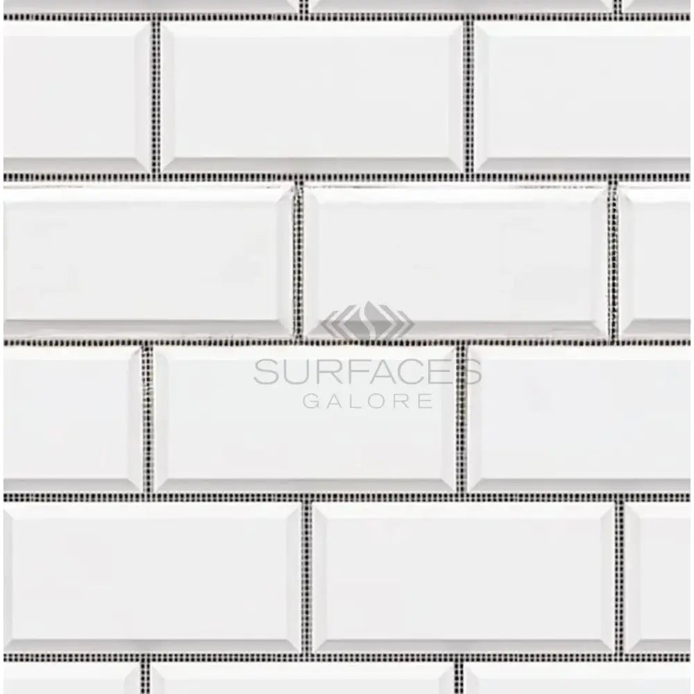 White beveled subway tile from Dolomite Prestige 2X4 Brick Mosaic Marble polished-honed