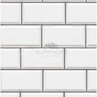 White beveled subway tile from Dolomite Prestige 2X4 Brick Mosaic Marble polished-honed