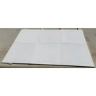 White square tiles from Dolomite Prestige 10-inch Hexagon Mosaic Marble collection