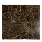 Four brown marble tiles from Emperador Dark Marble 1X1 Mosaic Tumbled collection