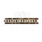 Elegant decorative marble tile border featuring Emperador Dark Oro and Crema Marfil dots