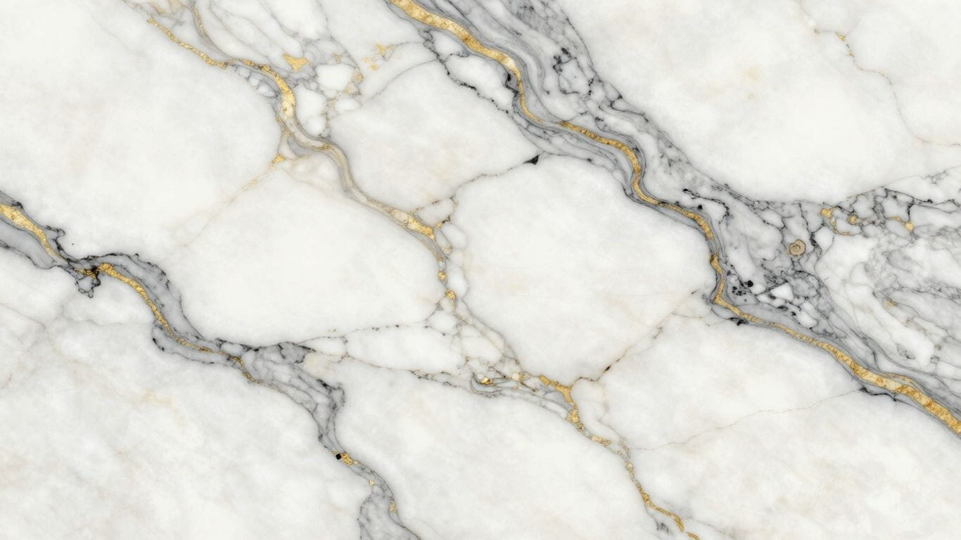 Calacatta Macaubas quartzite with elegant grey and gold veining.
