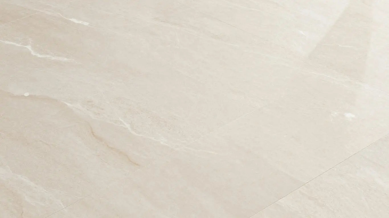 Sparkling clean limestone floor with natural veining.