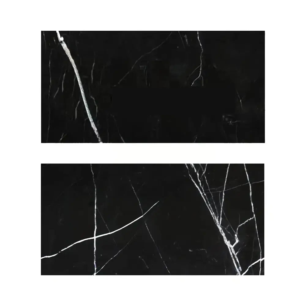 Two black marble tiles with white veining from Nero Marquina Black Marble collection
