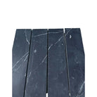 Black marble tiles with striking white veining in Nero Marquina Prestige 3x12 Field Tile