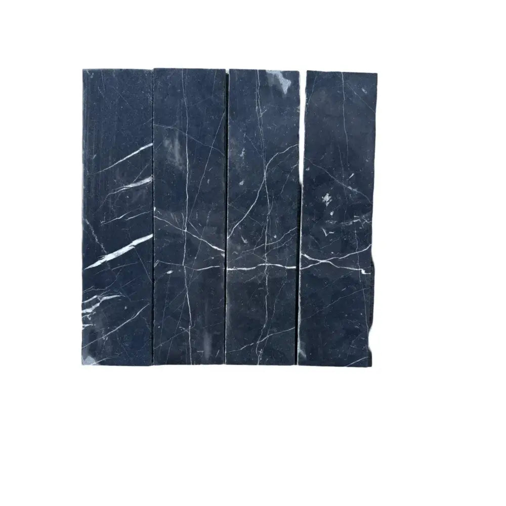 Black Nero Marquina marble tiles with striking white veining for elegant flooring