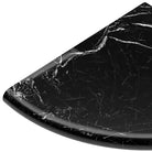Black marble tabletop corner featuring Nero Marquina Marble Shower Corner Shelf