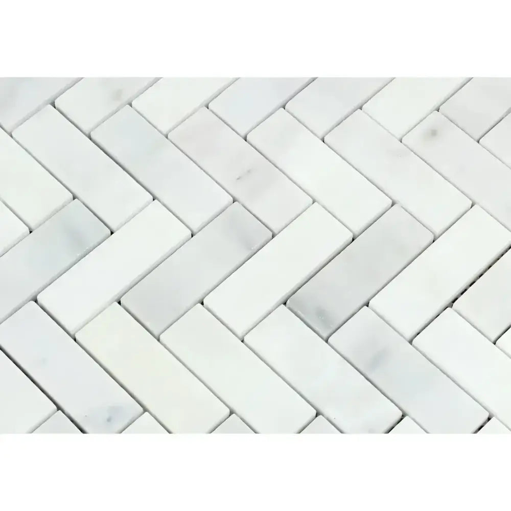 White marble herringbone tile pattern in Oriental White Aurora Asian Statuary mosaic