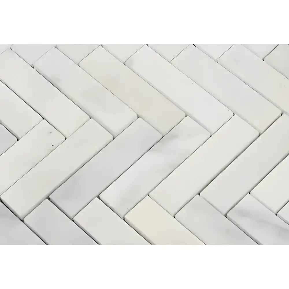 White herringbone marble mosaic tile pattern from Oriental White Aurora collection