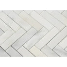 White herringbone marble mosaic tile pattern from Oriental White Aurora collection