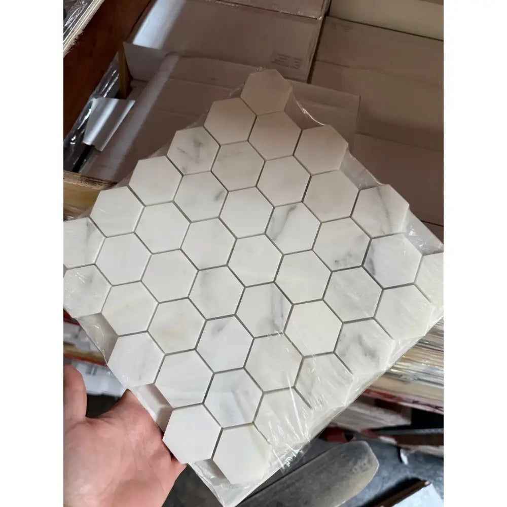 Hexagonal marble tile sheet featuring Oriental White Aurora White Asian Statuary finish