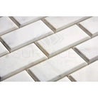 White marble brick tiles in Oriental White Aurora Asian Statuary 2X4 mosaic