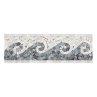 Mosaic wave border from Oriental White Aurora tile with blue-gray dots, polished or honed