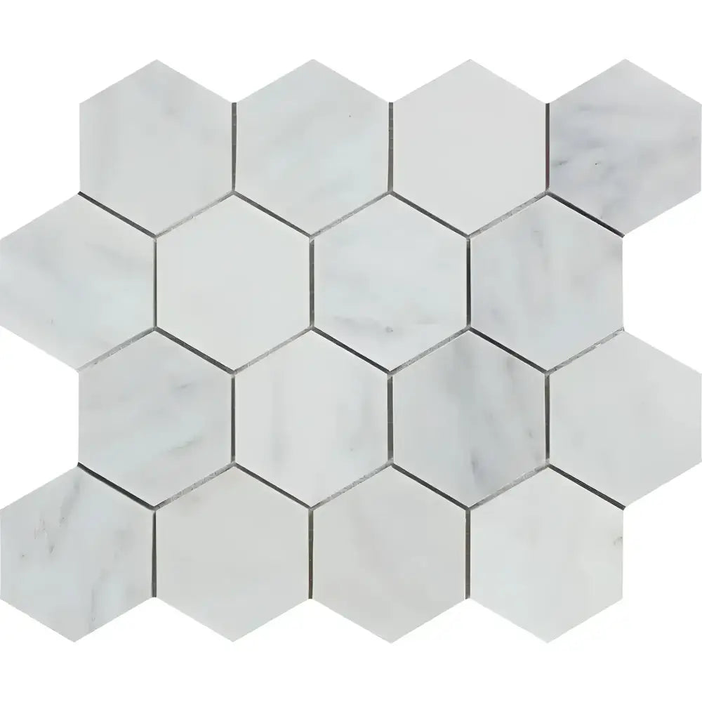 Hexagonal marble tile mosaic featuring Oriental White and Aurora White Statuary finishes