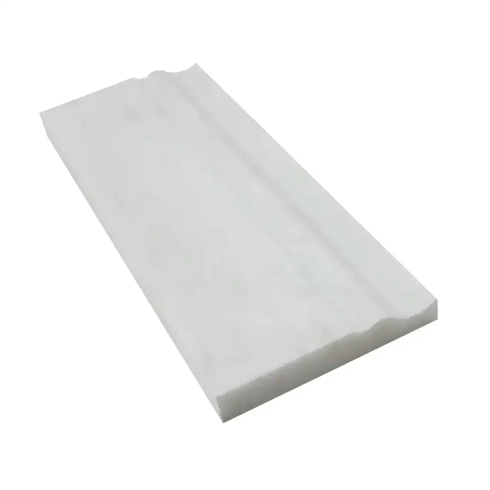 White marble tile from Oriental White Aurora Asian Statuary 4 3/4X12 Baseboard Trim