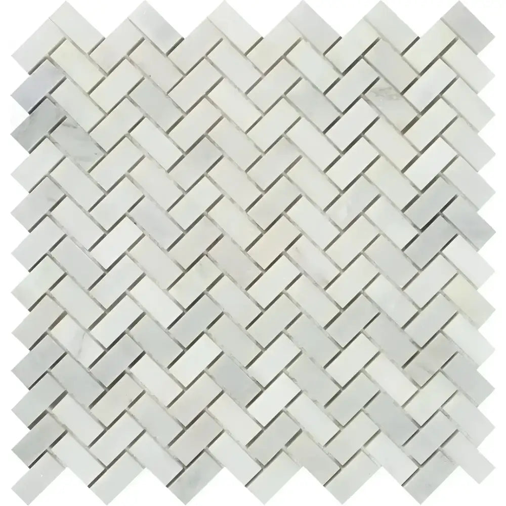 Herringbone pattern of white marble tiles in Oriental White Aurora Marble Mosaic