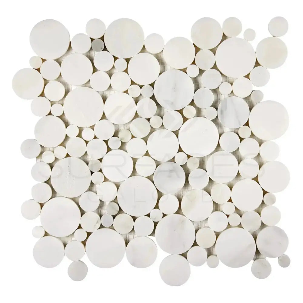 White circular mosaic tile from Oriental White Aurora Asian Statuary Bubbles Marble collection