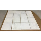 White marble-patterned floor tiles from Oriental Aurora Asian Statuary Marble 12x12