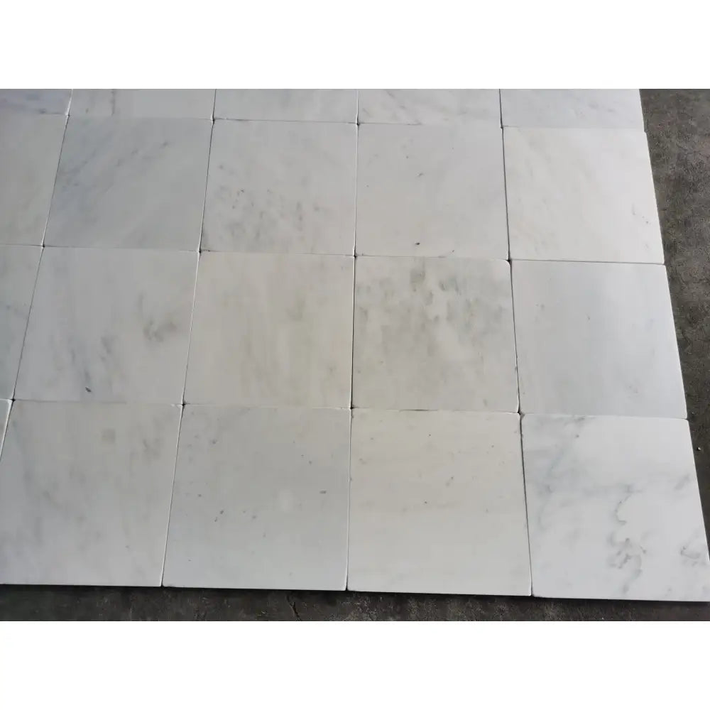 White marble floor tiles from Oriental Aurora Asian Statuary Marble 12X12 Tumbled