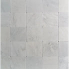 White marble tile grid from Oriental White Aurora Asian Statuary Marble 12x12 Tumbled