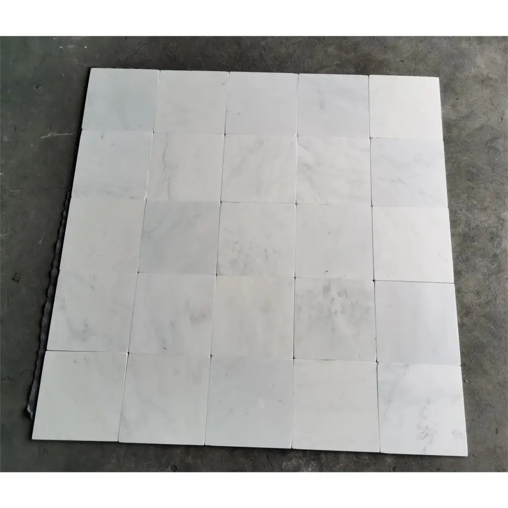 White marble tile squares from Oriental White Aurora Asian Statuary Marble 12x12 Tumbled
