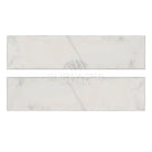 Two rectangular Oriental White Aurora Marble tiles with polished finish for flooring or walls