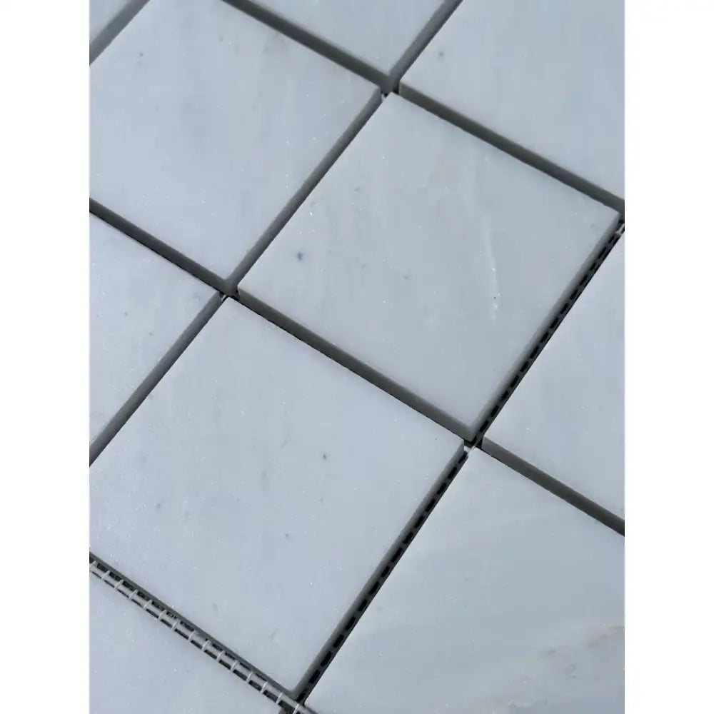 White square mosaic tiles from Oriental White Aurora Asian Statuary Marble